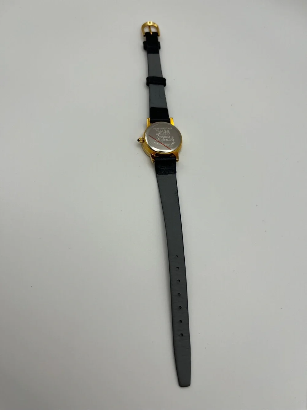 Gold-Tone Watch with Black Leather Strap